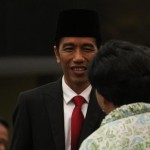 Ali Tunjukkan Foto Jokowi dan Harjono