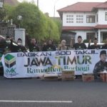 Ramadhan Berbagi ,PW AMK  Jatim bagikan 500 takjil di Taman Bungkul Surabaya